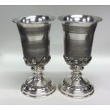 A pair of good Continental silver goblets with scr