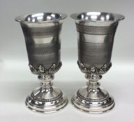 A pair of good Continental silver goblets with scr