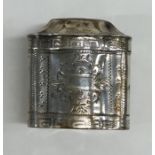 A small Dutch hinged top silver box decorated with