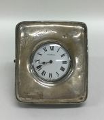 A square hinged silver Goliath watch case. Birming