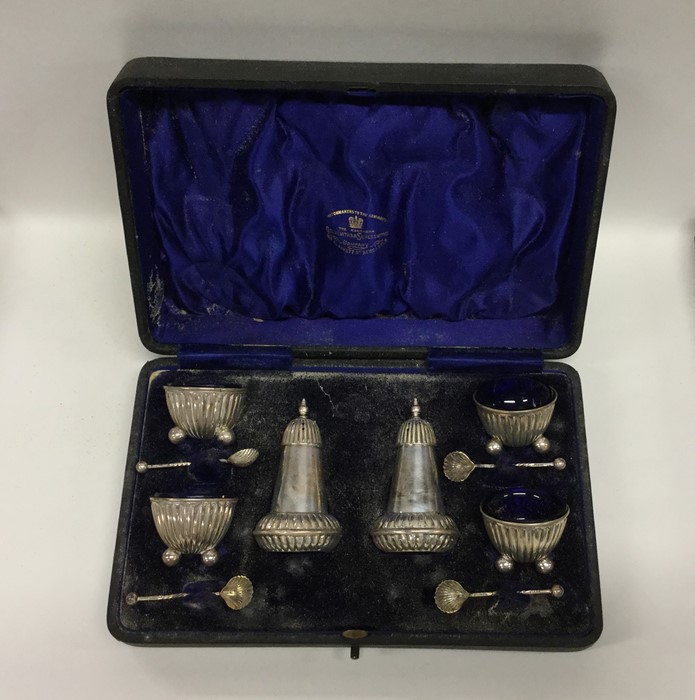 A boxed six piece silver cruet set. Birmingham. Es