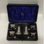 A boxed six piece silver cruet set. Birmingham. Es