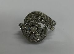 A large oval diamond dress ring in platinum mount.