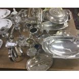 A large quantity of plated cruets, baskets etc.