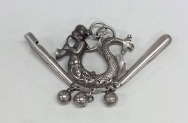 A Dutch silver whistle with loop top and bell deco