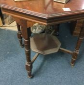 An Edwardian mahogany occasional table.