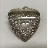 A modern silver heart shaped vesta decorated with