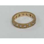 A large rose gold diamond full eternity ring in 18