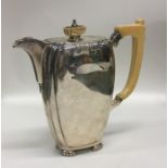 A good quality silver Mappin & Webb hot water jug