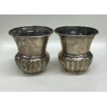 A pair of Edwardian silver half fluted planters. L