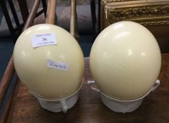 Two large ostrich eggs.