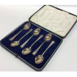 A boxed set of six silver coffee spoons. Sheffield