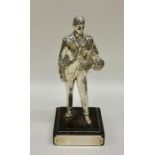 An unusual silver presentation figure of a man on