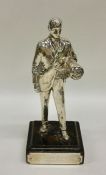 An unusual silver presentation figure of a man on