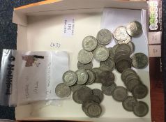 A carton of pre-1947 silver coinage.