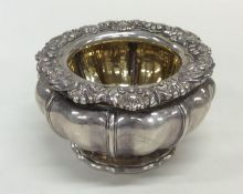 PAUL STORR: A Georgian cast silver salt with gilt