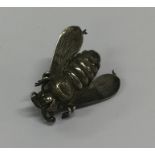 An unusual silver brooch in the form of a bumble b
