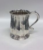 A good George II silver pint mug with baluster sha