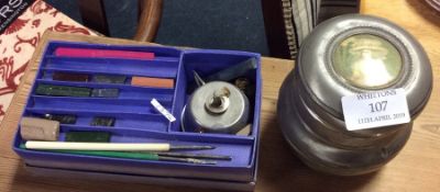 A music box together with sealing wax.