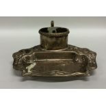 A good silver inkstand attractively decorated with