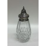 A silver and cut glass sugar caster. Birmingham. E