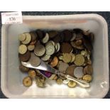 A quantity of coinage and cap badges.