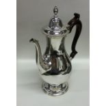 A good Georgian style hinged top silver hot water