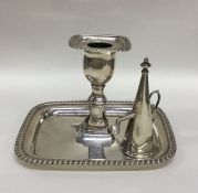 A Georgian square based silver chamber stick toget