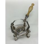 An unusual Queen Anne silver kettle stand and burn