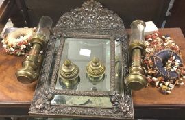 An Oriental mirror, copper lamps etc.