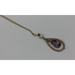 An attractive amethyst and pearl drop pendant on g