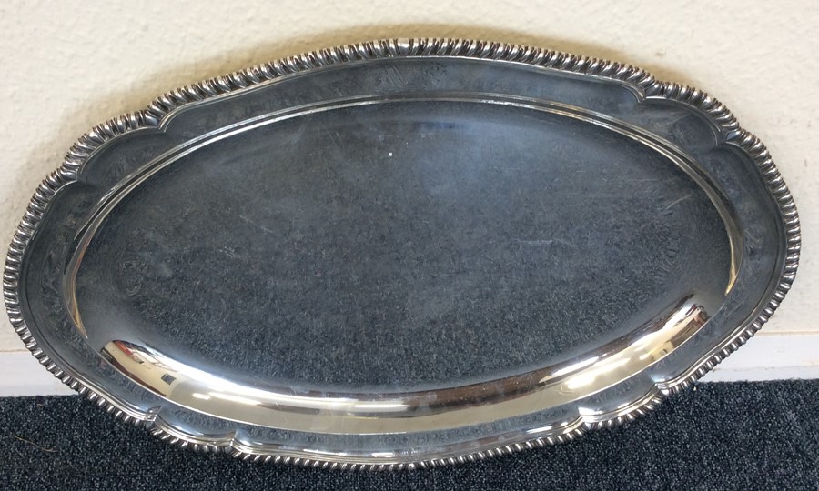 A massive Georgian silver oval meat dish with gadr - Image 2 of 3