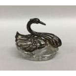 A silver and glass mounted model of a swan with ou