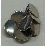 A good set of seven Georgian plain silver buttons.