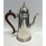 A Georgian style tapering sided silver coffee pot