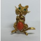 A French high carat gold brooch in the form of a s