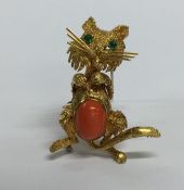 A French high carat gold brooch in the form of a s