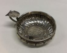 An Antique silver wine taster with coin inset to b