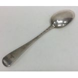 A Georgian Hanoverian silver dessert spoon. London