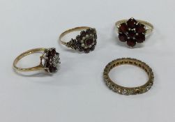 An Antique garnet and pearl ring together with thr