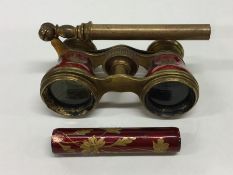 A pair of enamelled French opera glasses with gild