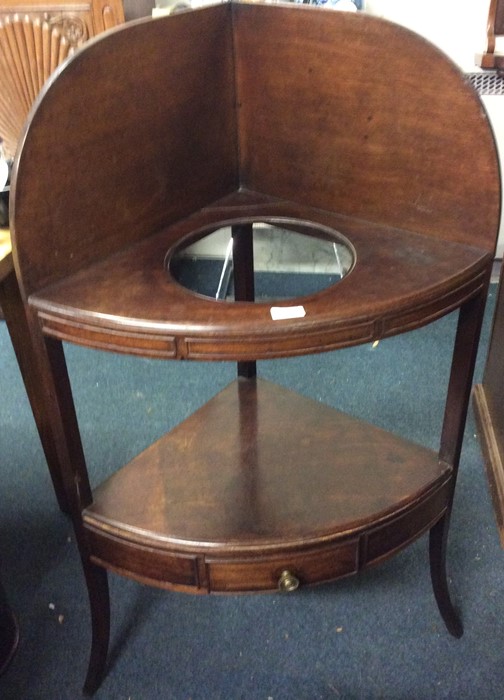 A mahogany corner wash stand.