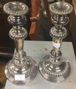 A pair of good plated candlesticks.