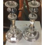 A pair of good plated candlesticks.