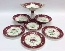 A Victorian red gilded dessert set on pedestal bas