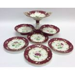 A Victorian red gilded dessert set on pedestal bas