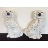 A pair of large Staffordshire dogs with gilding.