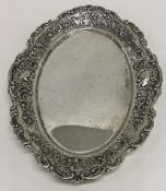 A Continental silver oval letter tray decorated wi