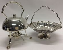 A silver plated circular cake basket together with