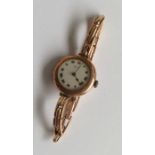 ROLEX: A lady's 9 carat wristwatch on expanding st
